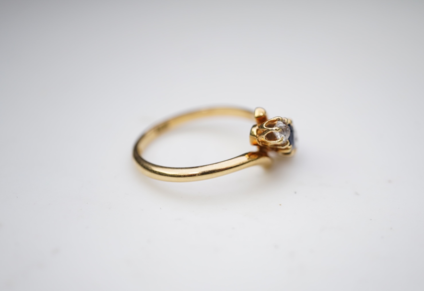 A sapphire and diamond three-stone ring, early 20th century